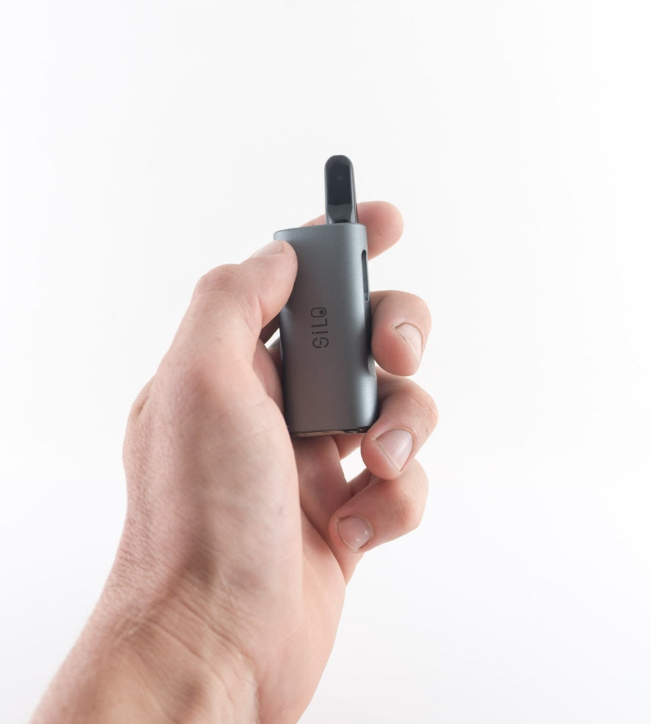 Grey CCELL Silo 510 vape battery in hand
