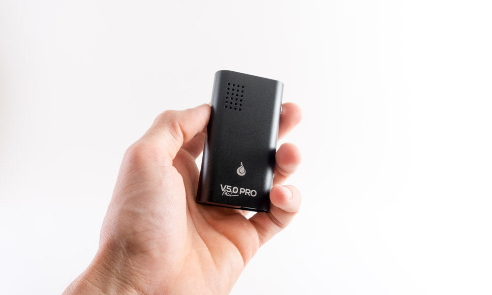 Flowermat Mini Pro in hand with white background